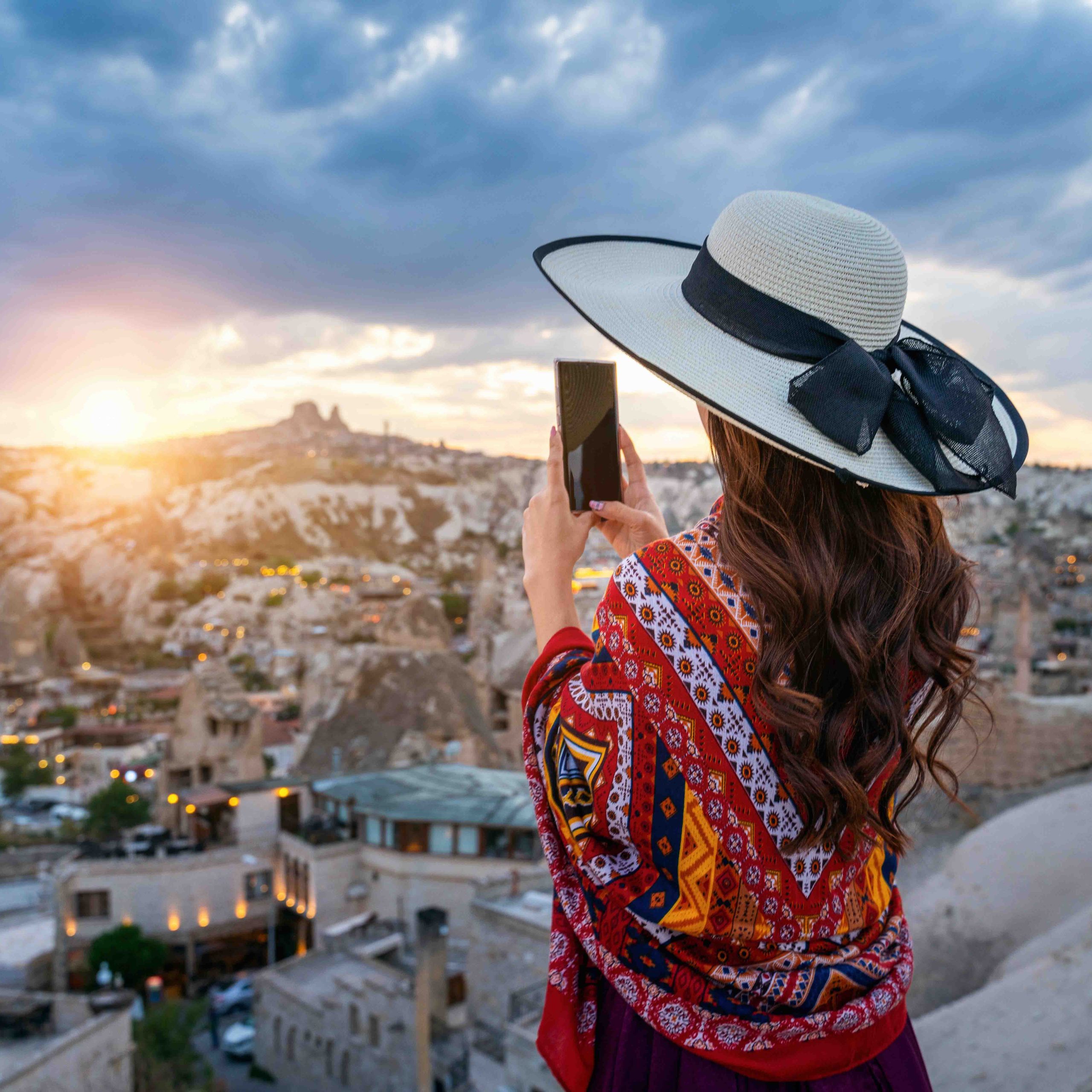 woman-take-photo-with-her-smartphone-goreme-cappadocia-turkey-copy-scaled